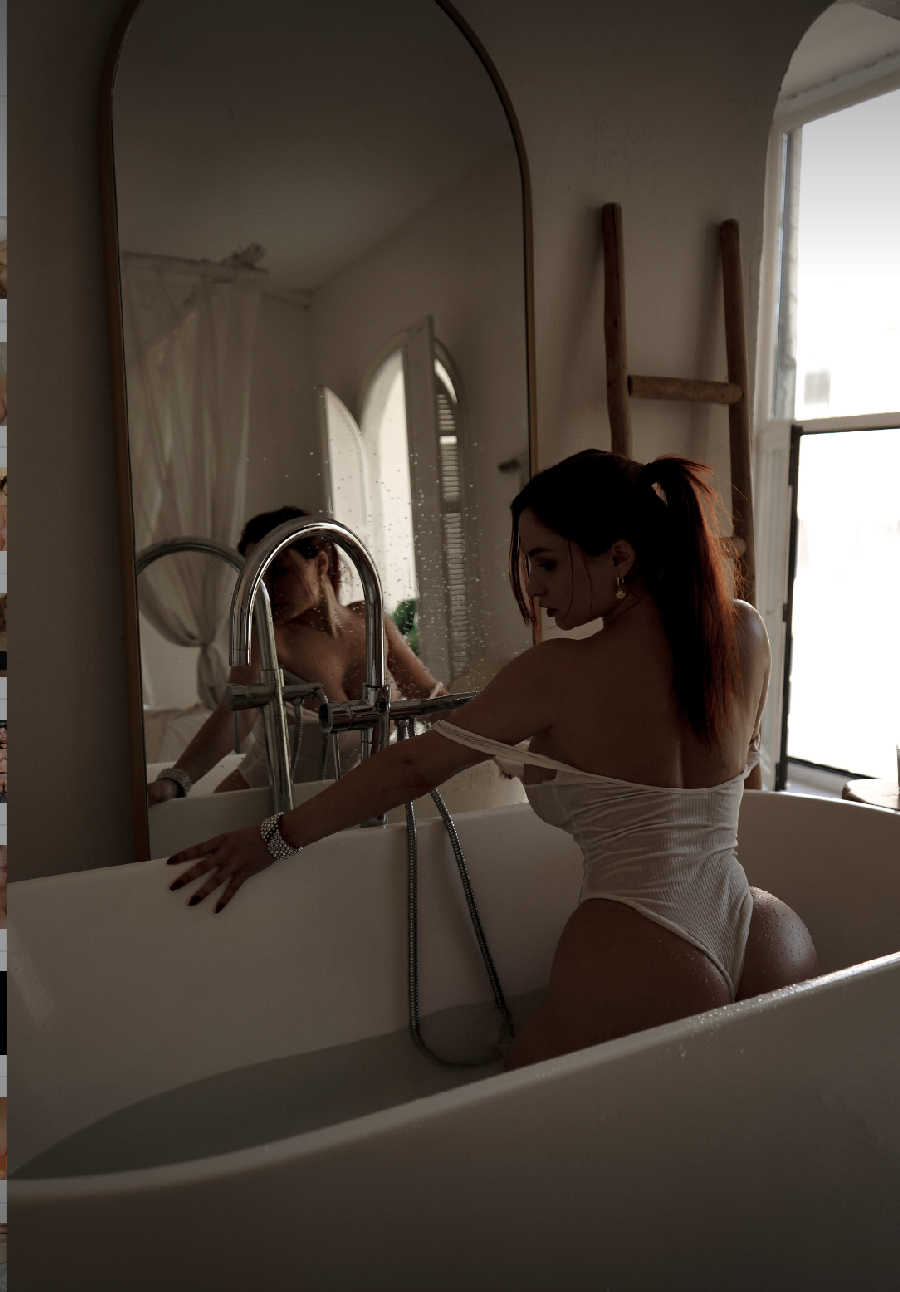 A playful frame from Miranda Faith nude — online in St. Georges