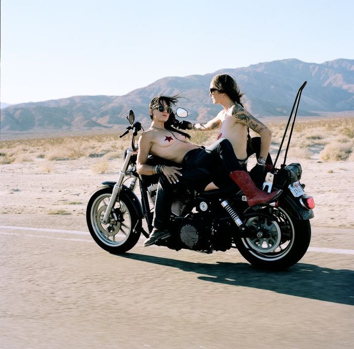 Girls on a motorcycle in St. Georges
