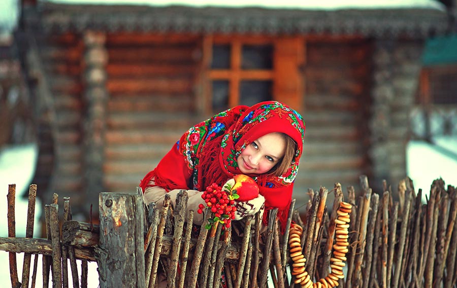 Sexy girl Women in Slavic costumes in St. Georges